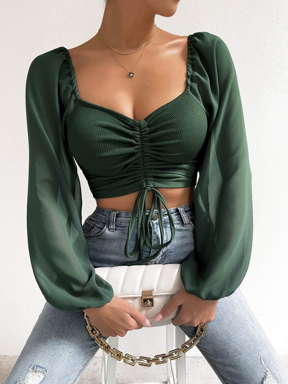 Blusa de Malha e manga longa verde escuro